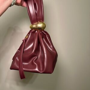 Elegant Burgundy Clutch with Gold Detail